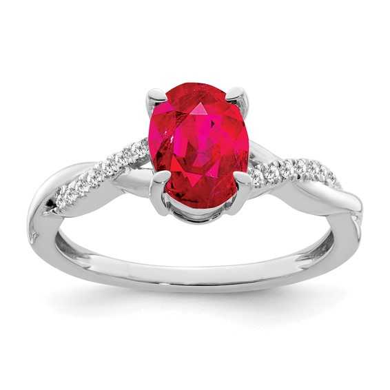 Lady's 14 Karat Fashion Ring Size 7 one 1.21ct Oval Ruby
0.07tw Round