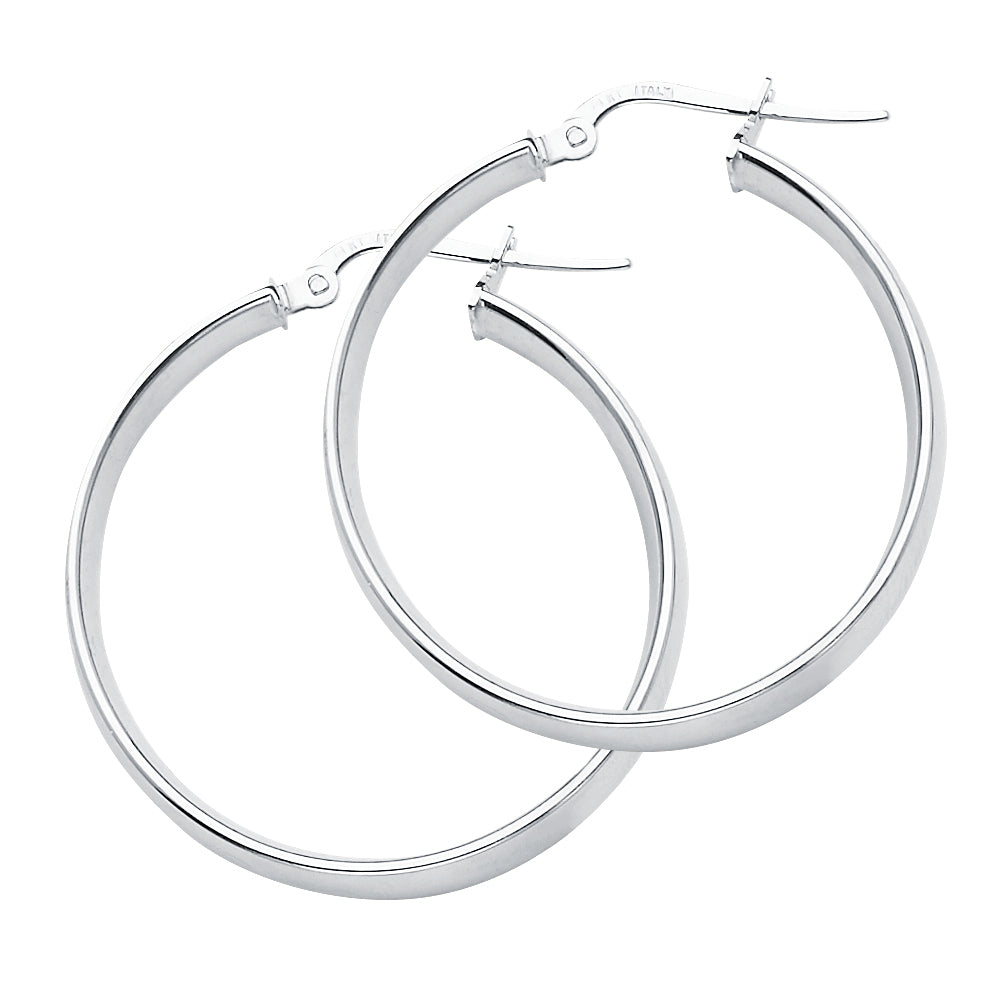 Lady's White 14 Karat hollow hoops Earrings Finish: Polished
Length: 31